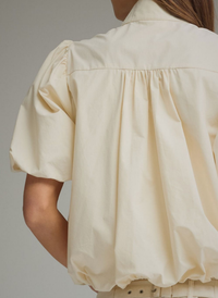 Tortoise Button Bubble Hem Blouse